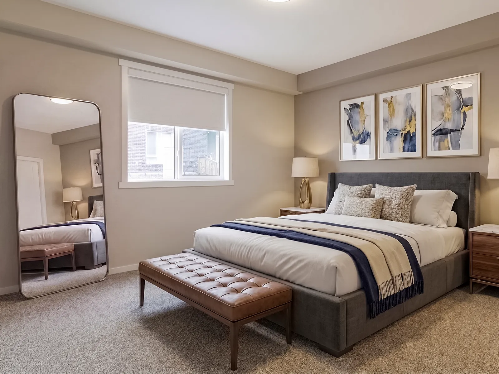 Primary bedroom at Emerald Place with a cordless roller shade