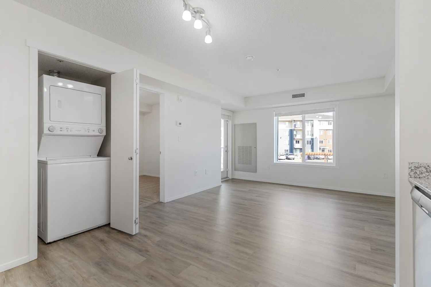 Move-in ready Emerald Place suite with in-suite laundry