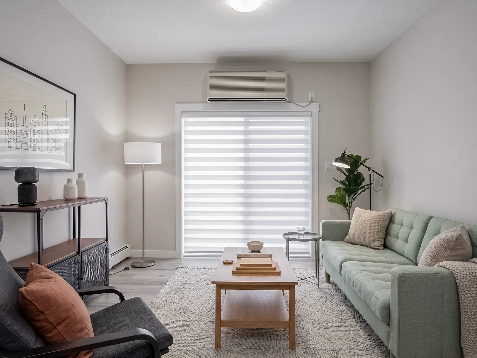 Living room at Meadowhaven with a shaded feature window
